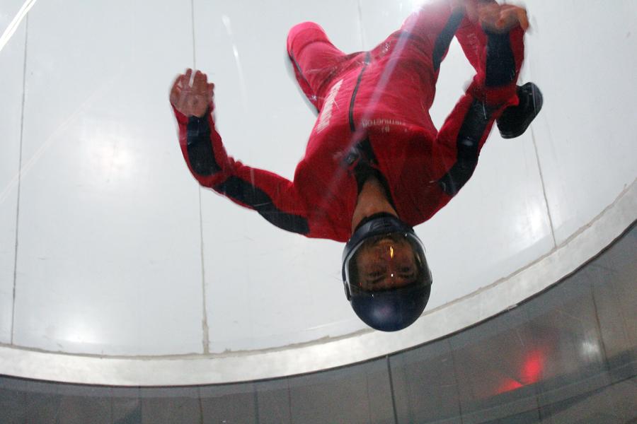 iFLY instructor demonstrates an upside-down flying position