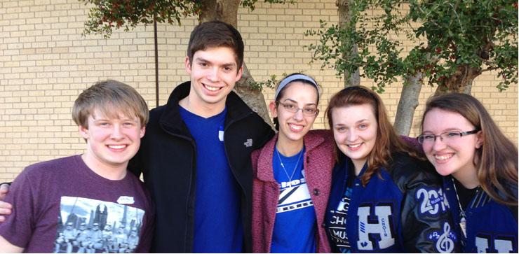 Choir members Michkael Rumpuff, Patrick Warren, Kathryn Brode, Gillian White and Kaylee Hairel pose outside of the school. All five members will be performing at a concert in San Antonio for making the All-State choir.