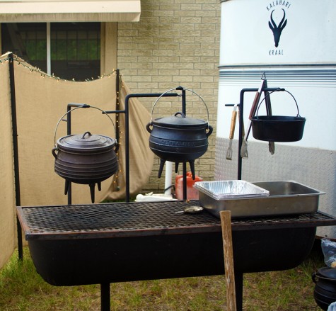 The iron pots, or potjies, are used to cook a South African stew submitted for judging.
