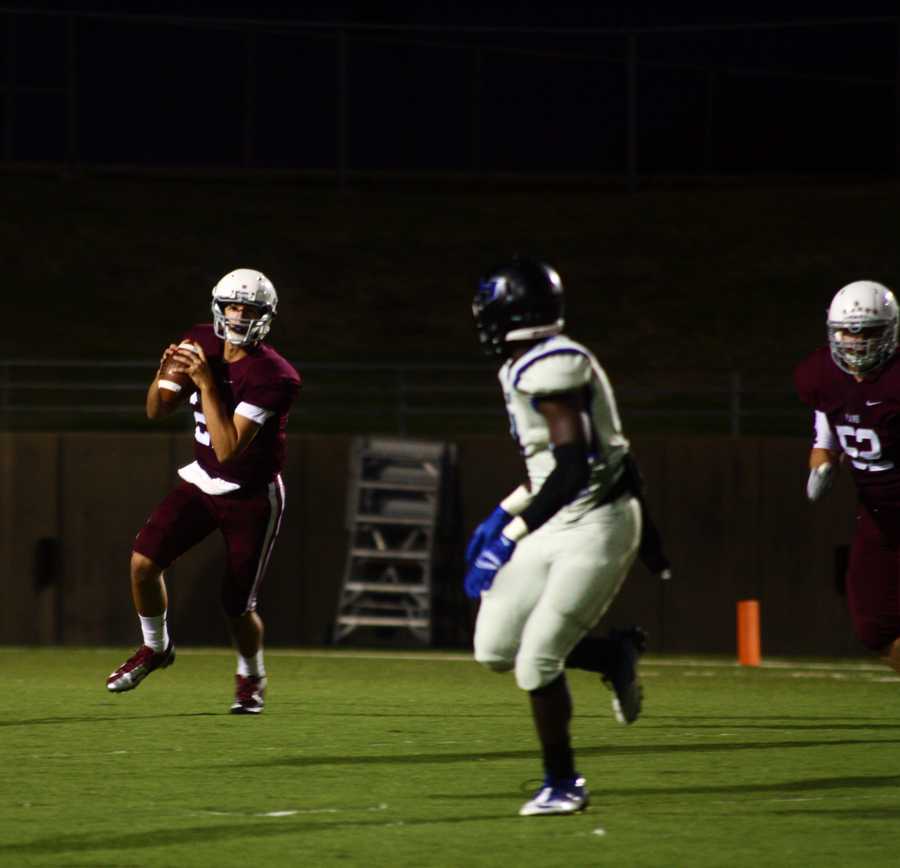 Plano gets ready to thro the ball, a play that ends up in a wildcat touchdown. 