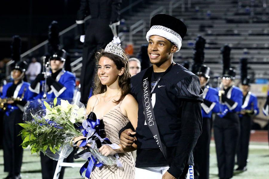 Burford and Burrer posing together as Homecoming King and Queen