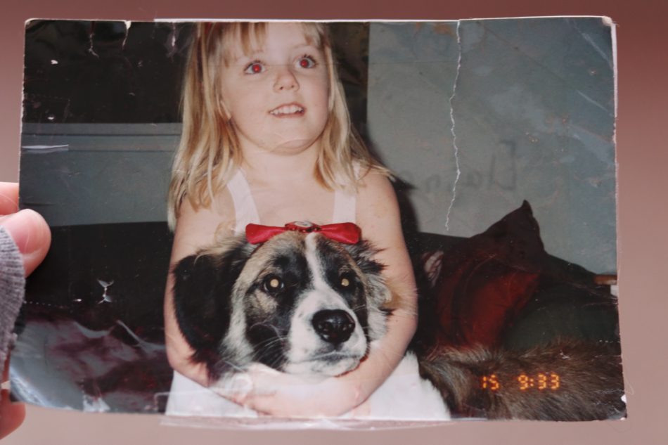 Elaine at age five with her dog Nemo. Losing many belongings in the fire, this was one of the photos able to be recovered.