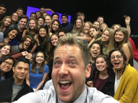 Corey Broom poses for a selfie with the theatre department.