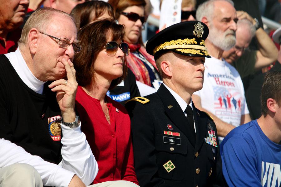 Veterans in the audience become emotional while listening to a Vietnam War veteran speak about the treatment of soldiers who returned from war. The veteran is related to counselor Kimberly Clingan.