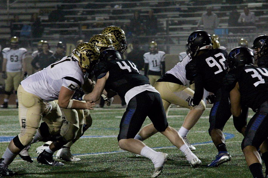 Senior Seth Shirey blocks a Panther player. 