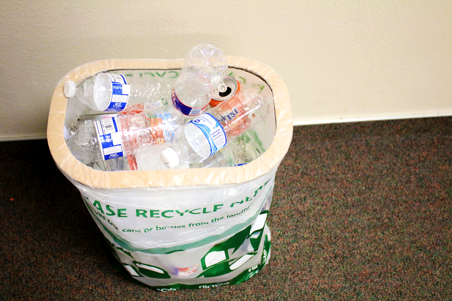 A+full+recycling+bin+sits+in+a+classroom.+Future+Generations+started+helping+out+teacher+Annette+Reese+with+the+recycling+program+this+year.