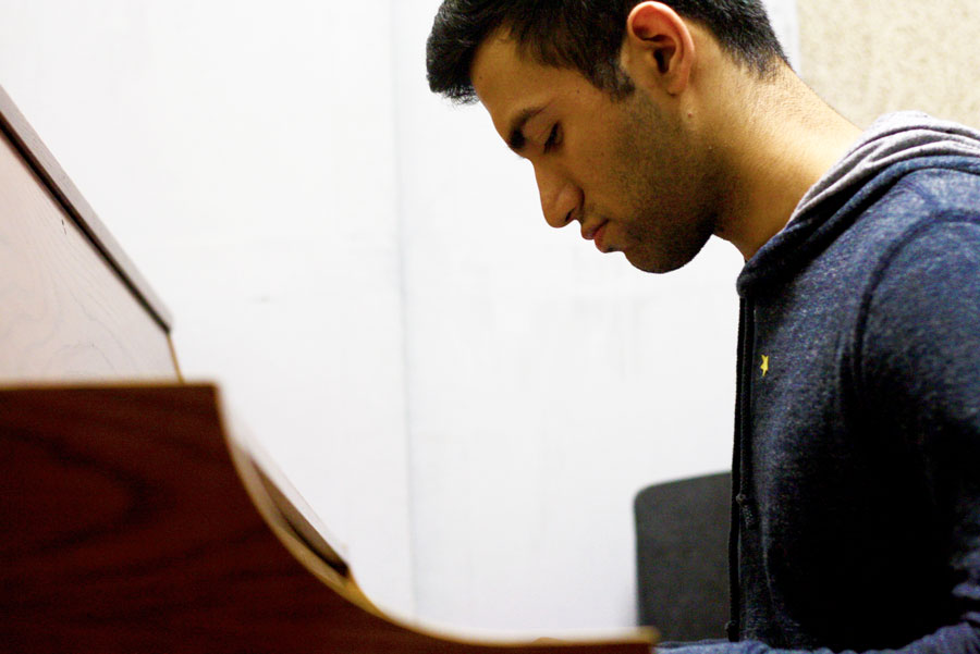 Lulay practicing on the piano. Along with playing the piano, Lulay has been playing the guitar for more than eight years.