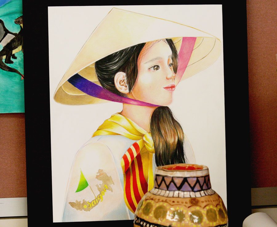 Two art pieces that were entered into the Hispanic Heritage Month art contest that was held from Sept. 15 to Oct. 15. The first prize winner was junior Evelyn Kha who made the portrait in the photo.