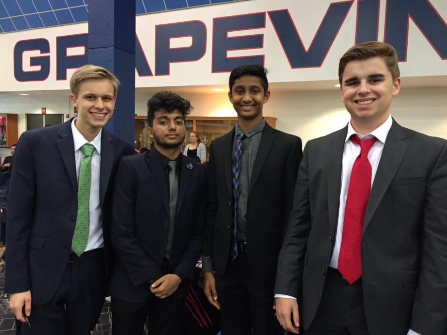 Shamblin (on right) with his friends at a debate tournament. They were competing at the Grapevine Invitational tournament.