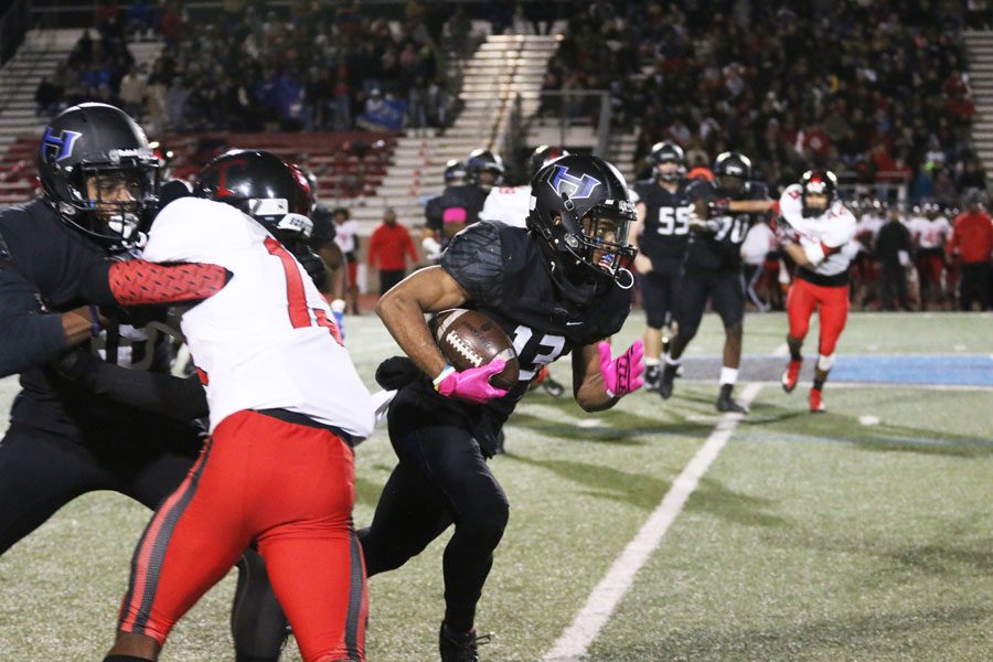 Senior wide receiver Jaren Mitchell runs toward the end zone. 