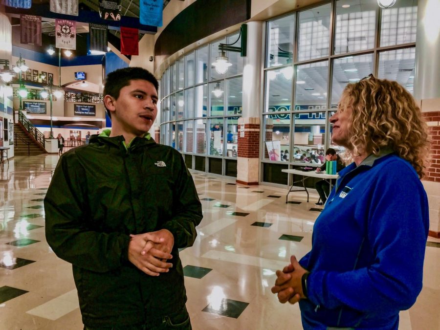 Daniel Elizardo discusses his plans for his future with assistant principal Sandra Lee. Elizardo said he wanted to open up a barber shop and pursue tattooing as a career.