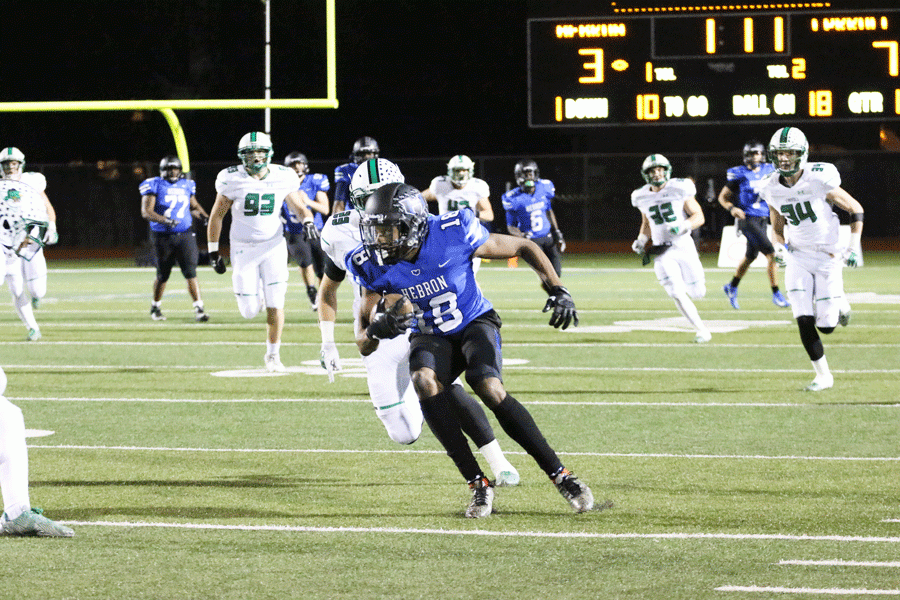 Senior wide receiver David Leonty catches a complete pass from senior quarterback Clayton Tune for 30 yards. 