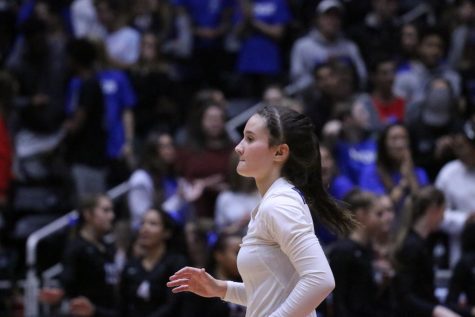 Senior Annie Benbow anticipates for the ball at the 2017 Volleyball Championships. Hebron was ranked first in state after winning the championships.