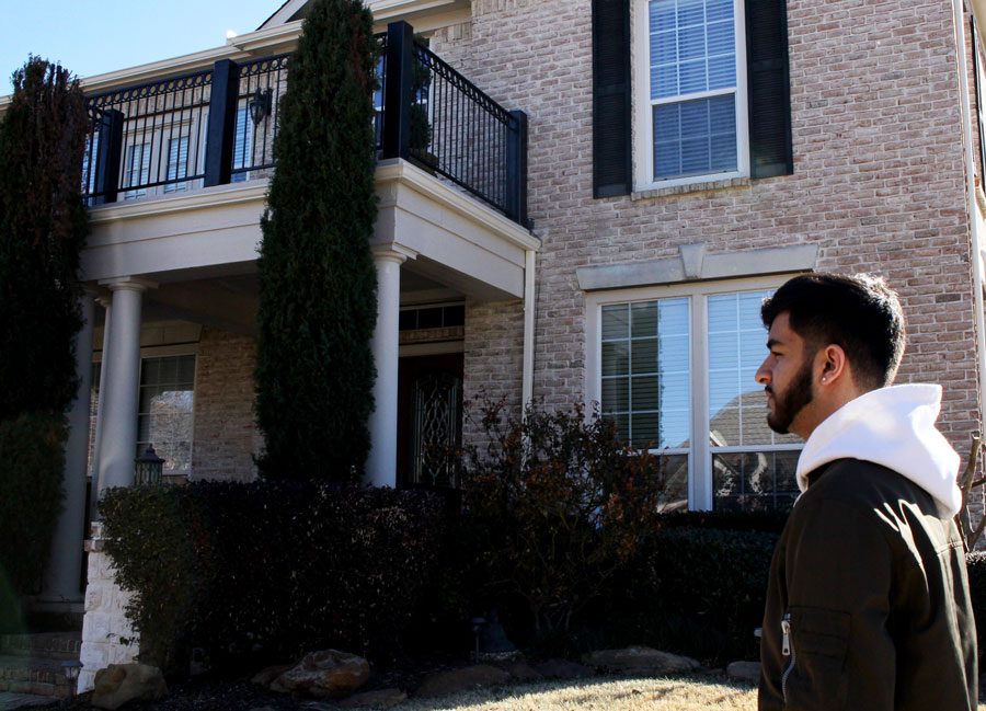 Rahil Baharia stands in front of the house where the burglary took place. Baharia moved six months after the event.