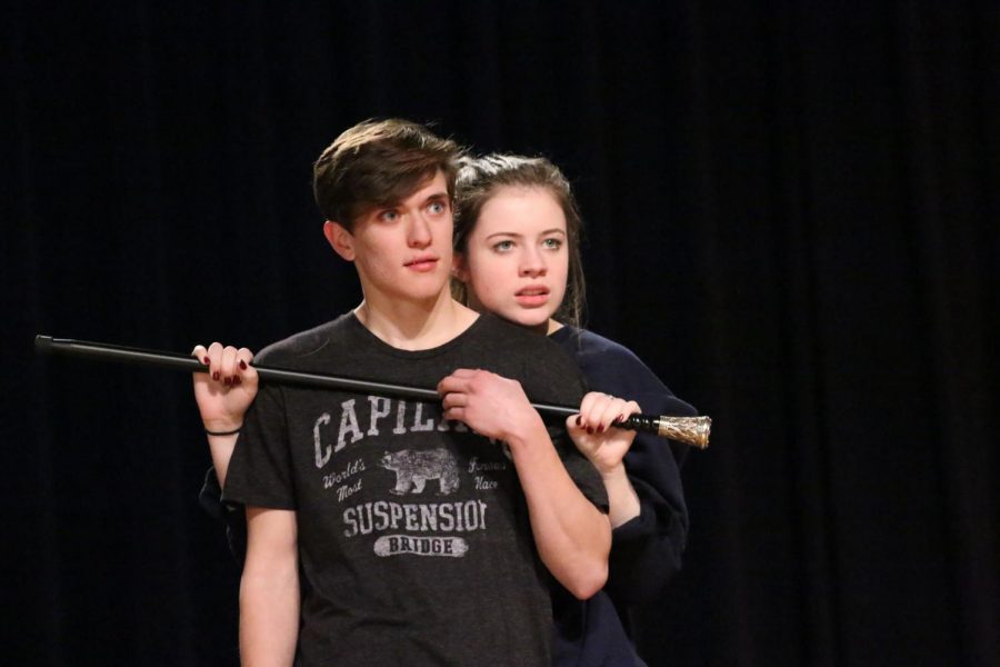 Senior Caleb Geddie, playing Antonio, and junior Caitlin Kresta, playing Meredith, rehearse the opening scene of Pinocchio.