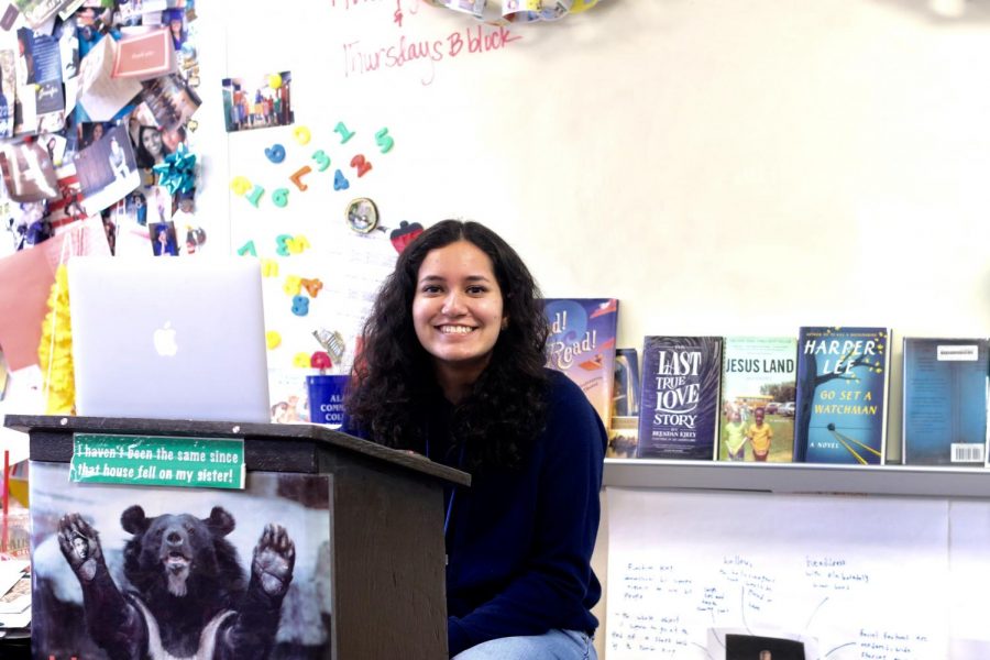 Senior Amna Yasin poses for a photo before teaching freshman and sophomores science before their competition in April. This year, Yasin is the co-captain of the Ac Dec team.