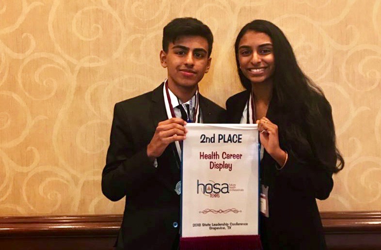 Juniors Jai Arora and Shraavya Chittoor pose with their award after winning 2nd place at State. They participated in Health Career Display.