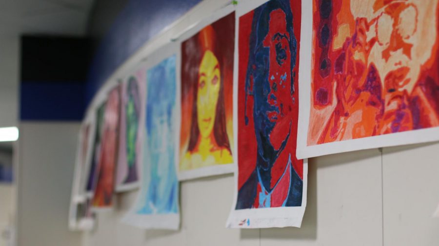 Art hangs on the walls. The art classes will present their pieces May 22.