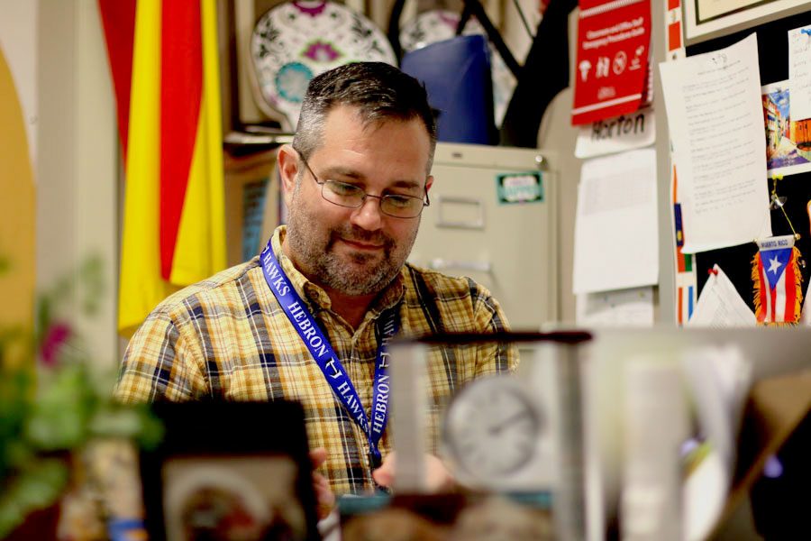 Spanish teacher Larry Horton sits down to grade his students’ quizzes. Horton’s students have had a 100 percent passing rate on the Spanish AP test for the past four years.