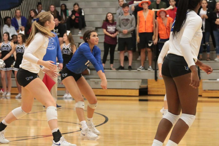 Junior Isabelle Ousby moves forward to save the ball in the game against Lewisville.