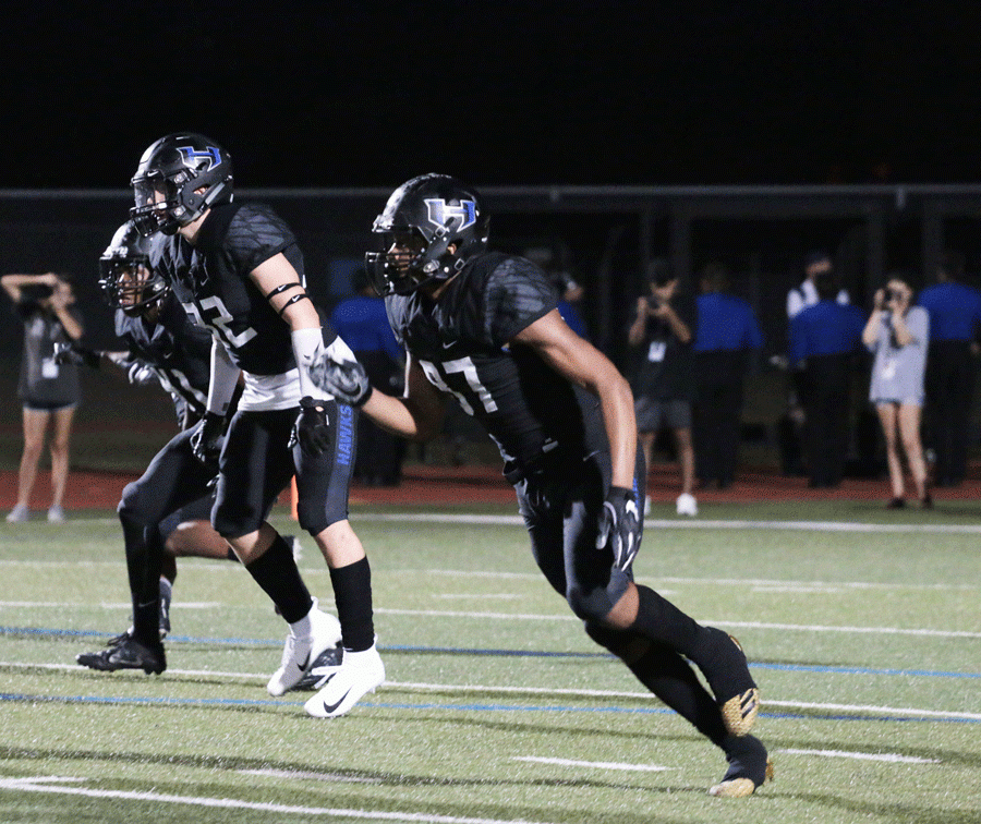 Junior defensive end Jeremiah Simon runs to stop an offensive Coppell player. 