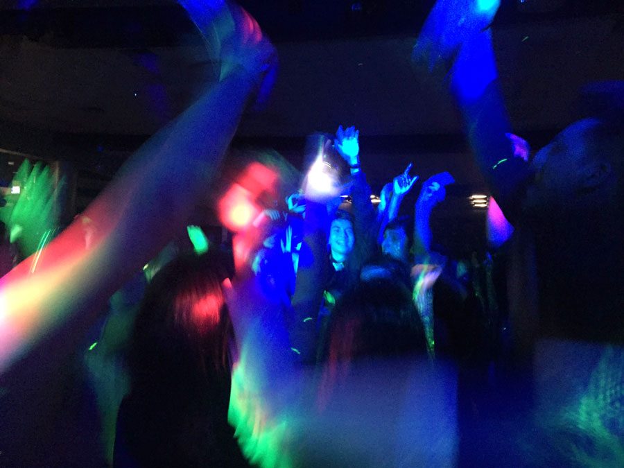 Students dance to the first song played during the homecoming dance. The dance began at 8 p.m. in the cafeteria. 