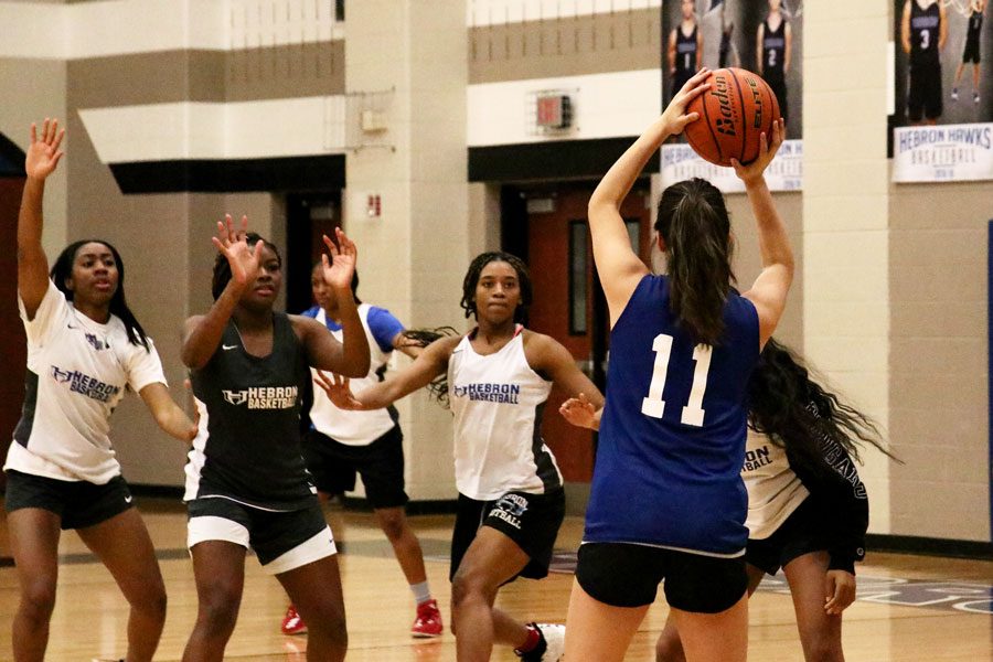 The Lady Hawks play each other as a part of their preparation for tonight’s game.