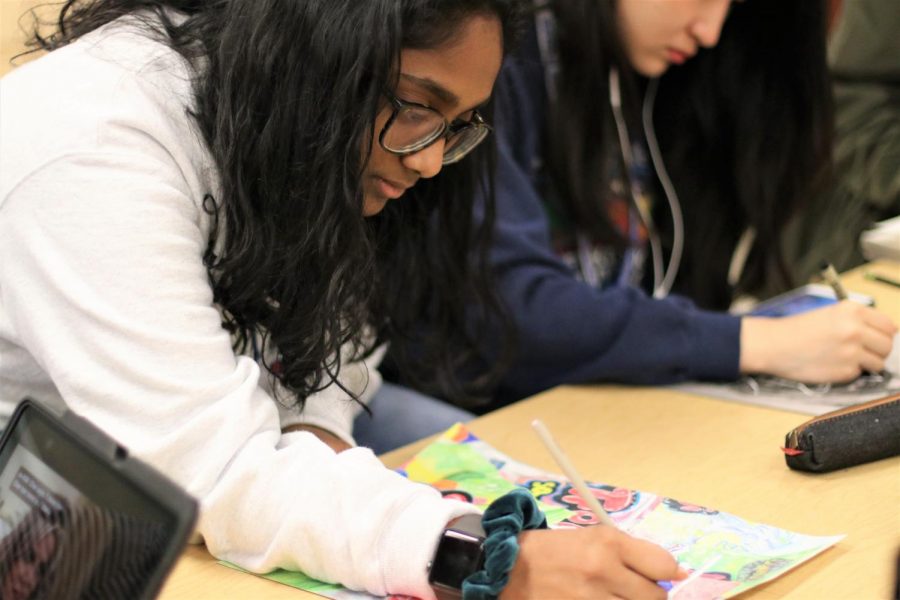 Junior Shruti Ada works on a recent art project in Art 4. 