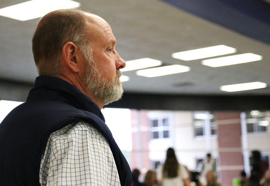 Principal Scot Finch supervises the cafeteria during lunch. This is Finchs ninth year being a principal at Hebron. 