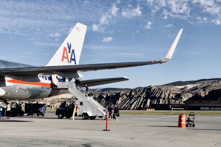 Passengers board the plane back to Dallas.