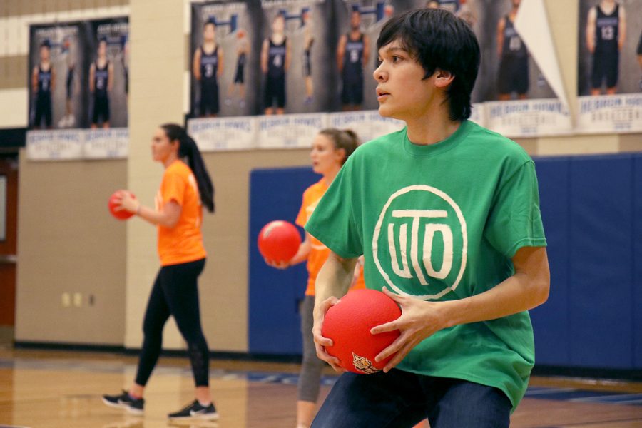 Senior Brendan Glasscock holds a dodgeball and watches the other team. 