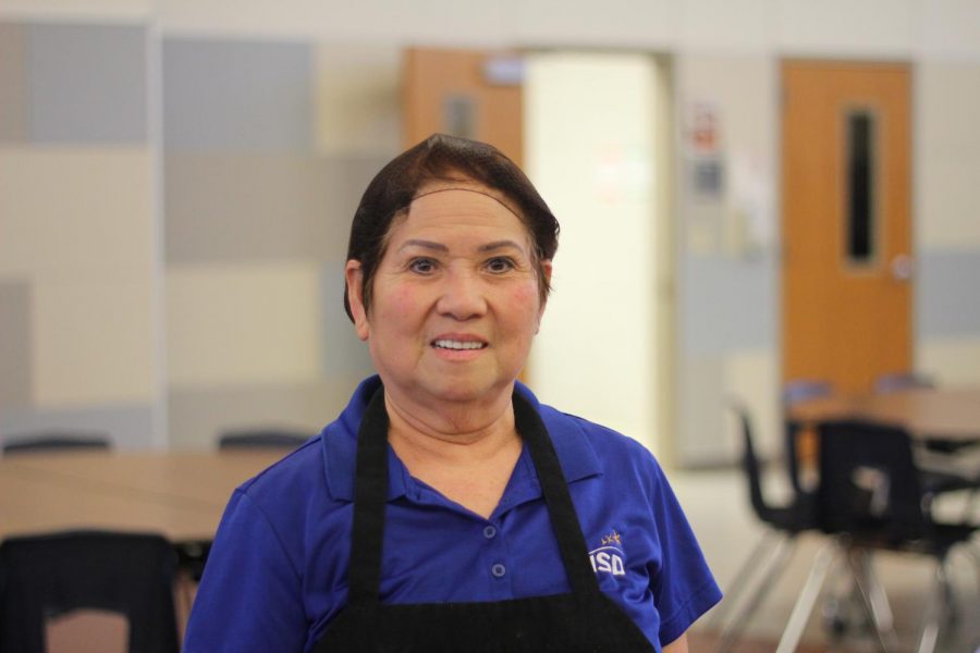 Cafeteria+employee+Sarin+Lam+poses+for+a+photo.+She+shared+her+story+of+immigrating+to+America+in+1975.