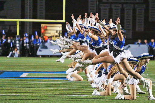 Silver Wings performs to the band’s rendition of “Dynamite“ by Taio Cruz during halftime. The team learned the choreography in one class period.