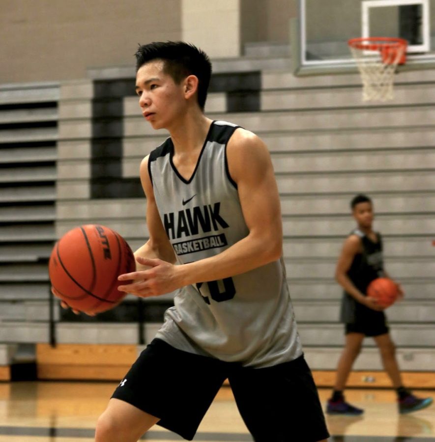 Sophomore Isaac Nguyen passes the ball to his teammate. They were practicing during fourth period for their upcoming game.
