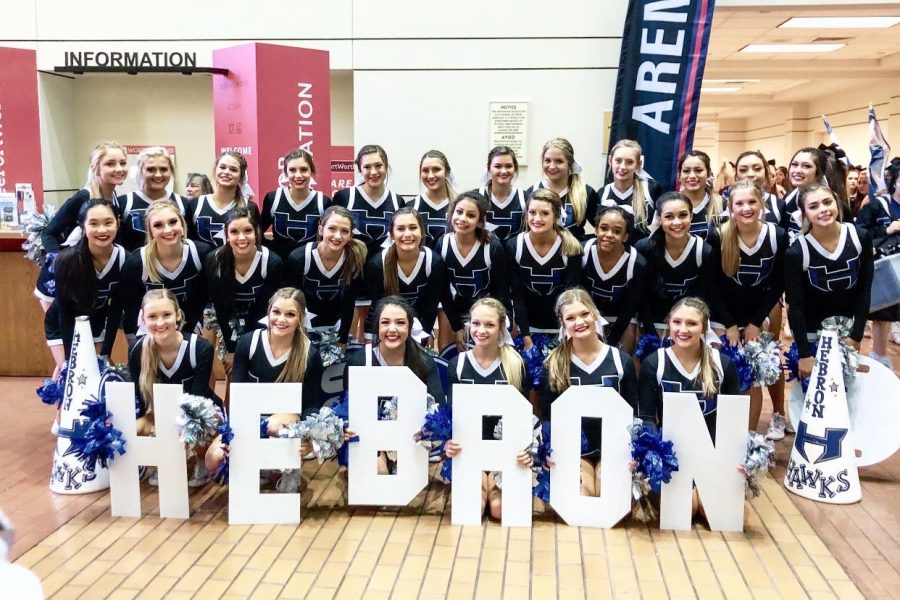 The cheer team poses for a picture before they perform for the judges. Going into the competition, they hoped to place in the final 20. “We have pretty tough competition as far as there’s a lot of good teams, so our first goal was to make it to finals,” Jackson said.