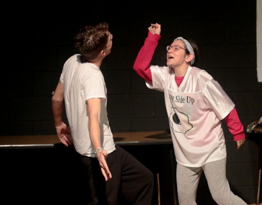 Sophomore Cate Garcia yells at freshman Jacob Martin as they practice for the upcoming improv show. Every block lunch, the cast practices for both blocks in order to prepare for the show in time. 