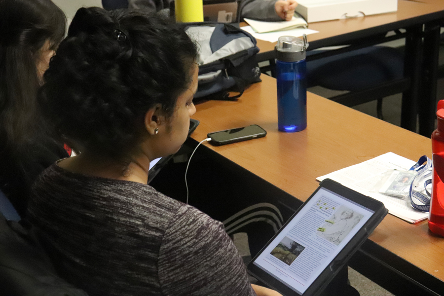 Senior Diya Baby studies art related to the plague during AcDecs hibernation day on March 4. To prepare for the state meet on March 6-7, the AcDec team hibernated by spending the entire school day studying in room 1220 prior to leaving for San Antonio on March 5.