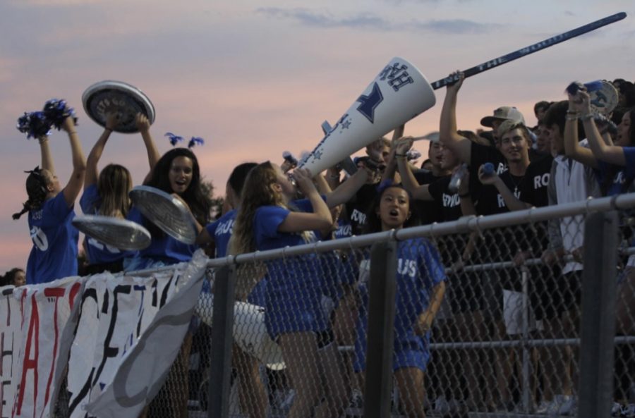 Members of Ruckus and Rowdy cheer at last year’s homecoming football game. Due to COVID-19 restrictions, the club does not have leaders, but members are still encouraged to participate.