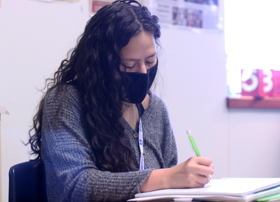 Junior Kaitlin Castillo takes notes in her AP U.S. History class. Castillo said she doesn’t feel GPAs this year are balanced. “I did like my [class rank] improvement, but I wasn’t as happy and didn’t have as much pride in it because it didn’t mean as much if not everyone was at school,” Castillo said.