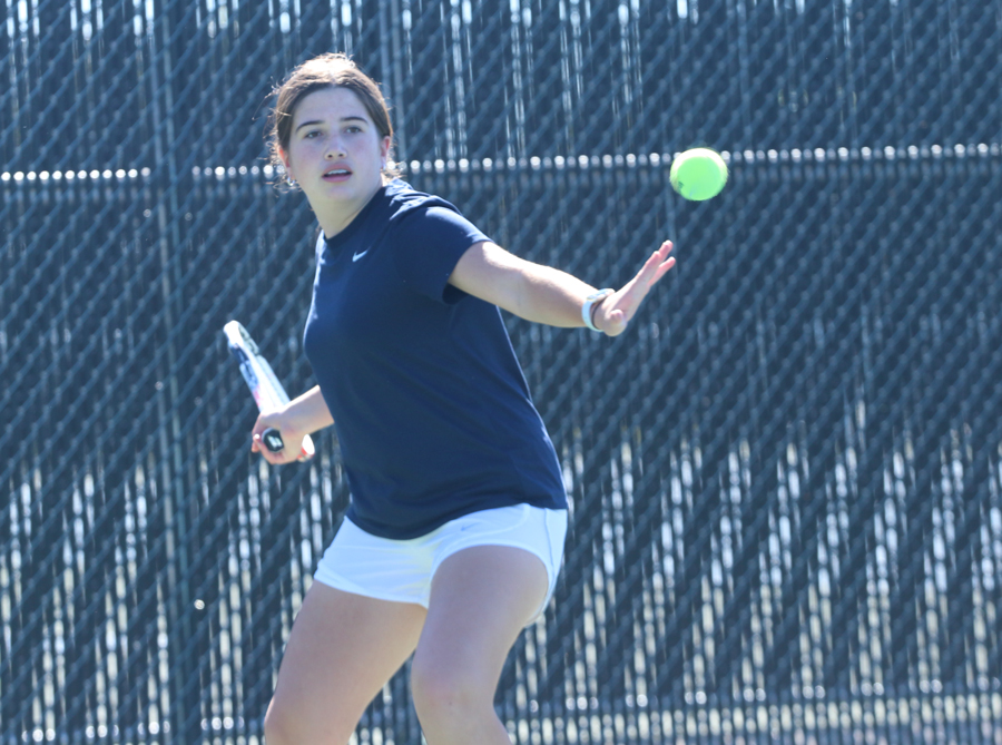 Freshman Macie Snyder returns the ball during tennis practice on Oct. 30. The tennis season ended on Oct. 20 with a game against Lewisville, and will start up again late next semester.