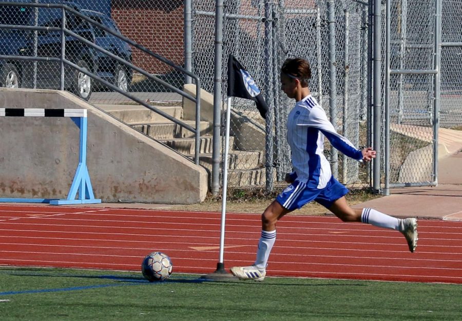 Sophomore Jett Thomson prepares for a corner kick. Thomson is one of three sophomores currently on varsity, after having none last year.