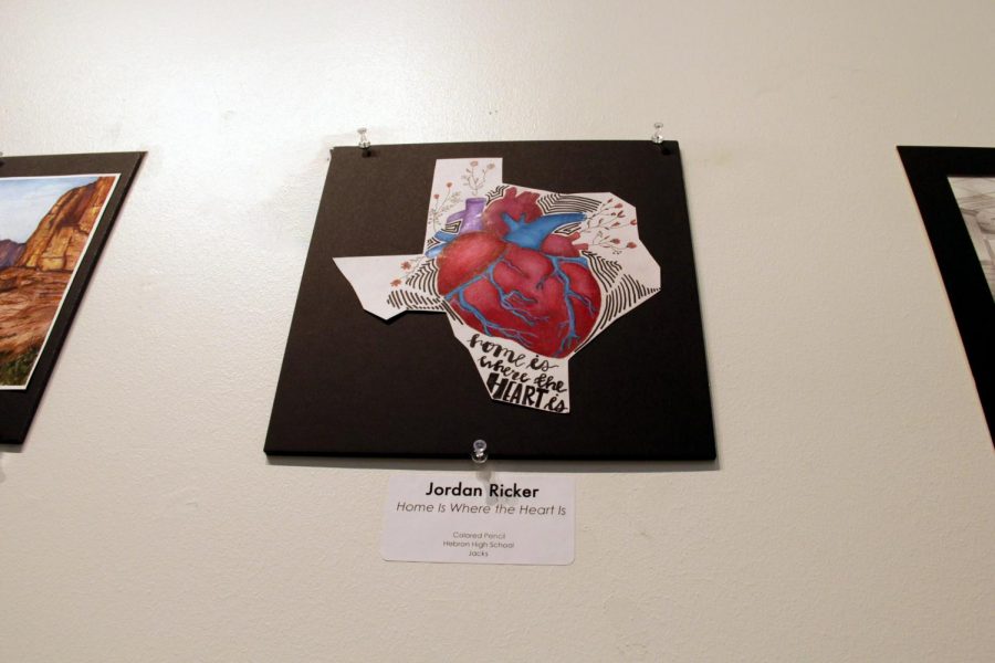 Rickers illustration hanging in the gallery. This is Rickers first time having her art in a show.