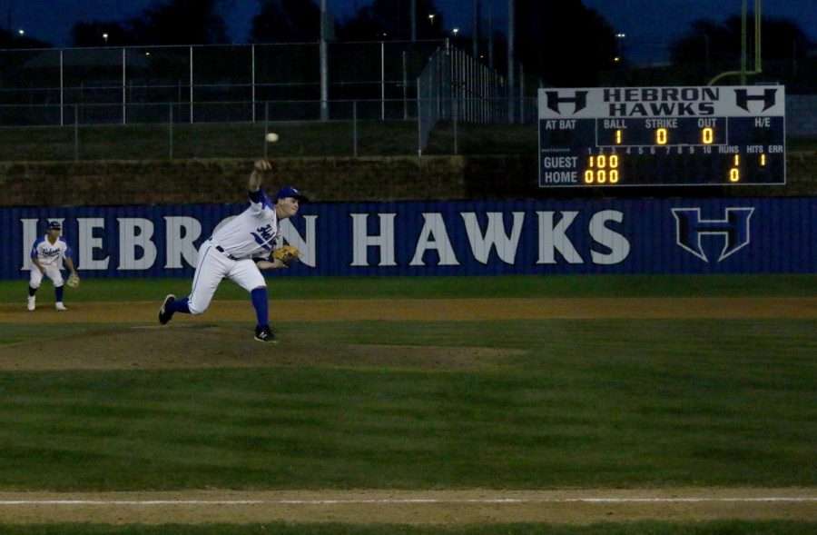 Senior Jeremy Slate strikes out a batter to start the third inning. Slate pitched the majority of the game and only gave up one run.
