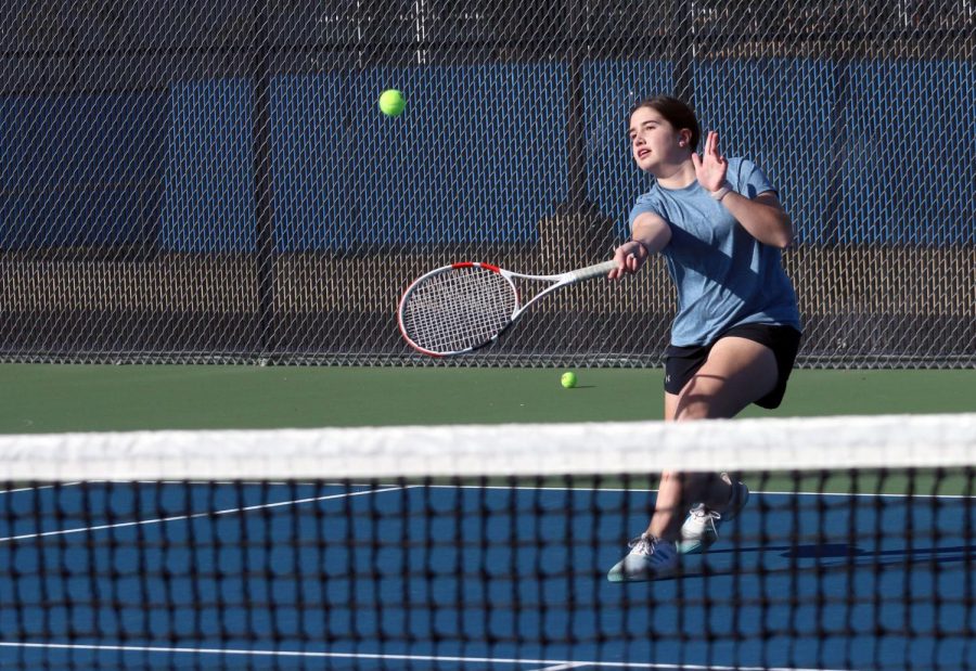 Freshman+Macie+Snyder+hits+a+forehand+approaching+shot.+She+is+currently+the+only+freshman+on+the+varsity+team.+