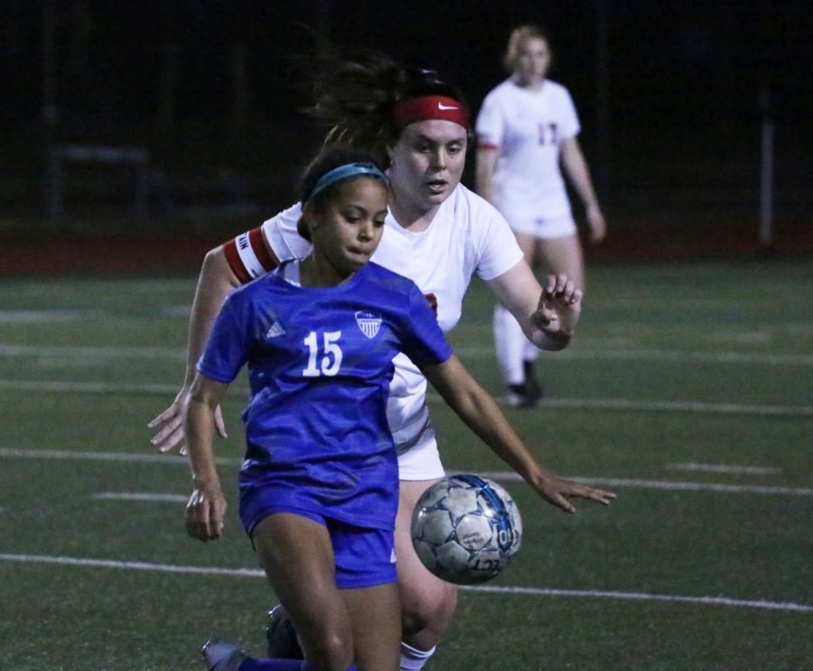 Sophomore forward Aryanna Jiminson blocks the ball from the opponent. Jiminson scored the first goal in the game. “That’s how we try to play,” head coach Bobby Vaughn said. “We stay on the sidelines and encourage them about how they need a run to start the game strong.”