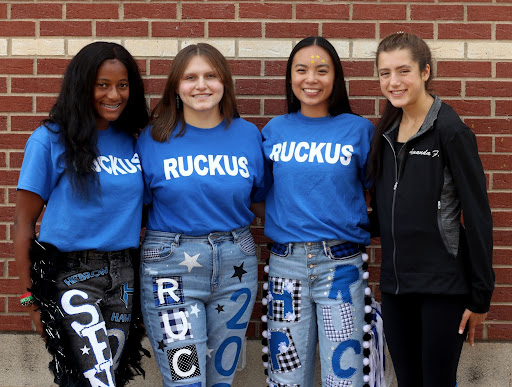 Seniors Kelis Armstrong, Paige Zagumny, Kaitlyn Hoang and Amanda Foy pose outside of the school. The four were elected as student council officers and will also serve as Senior Class officers.