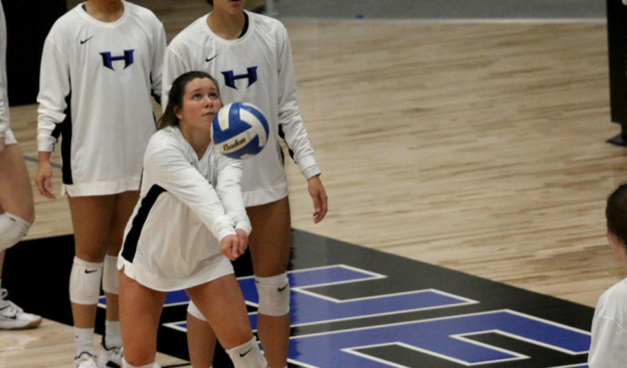 Junior Olivia Lowary warms up before the game against Rock Hill. The team will play their first district game on Sept. 10.