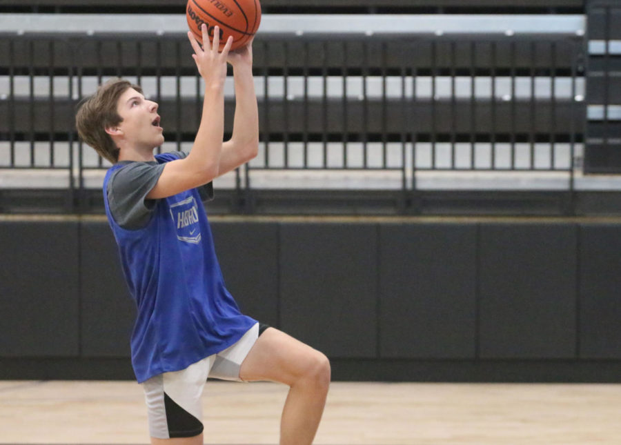 Guard Zander Rogiers makes a layup during practice on Monday Nov. 8 in the Hawk Arena.
