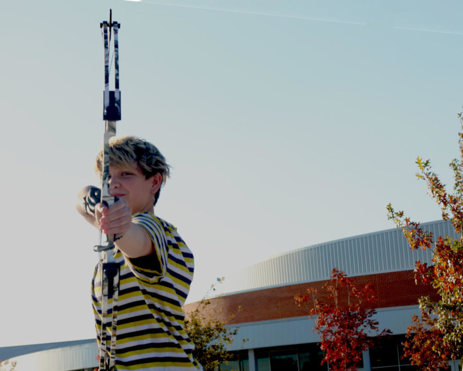 Senior Casey Ivanoff aims a bow. At the Texas-NASP Virtual State Competition in 2020, the overall girls’ rank at Hebron was 214 out of 1,453 schools. “My biggest goal is to make it to state this year, especially since its my last year on the team,” Ivanoff said. 
