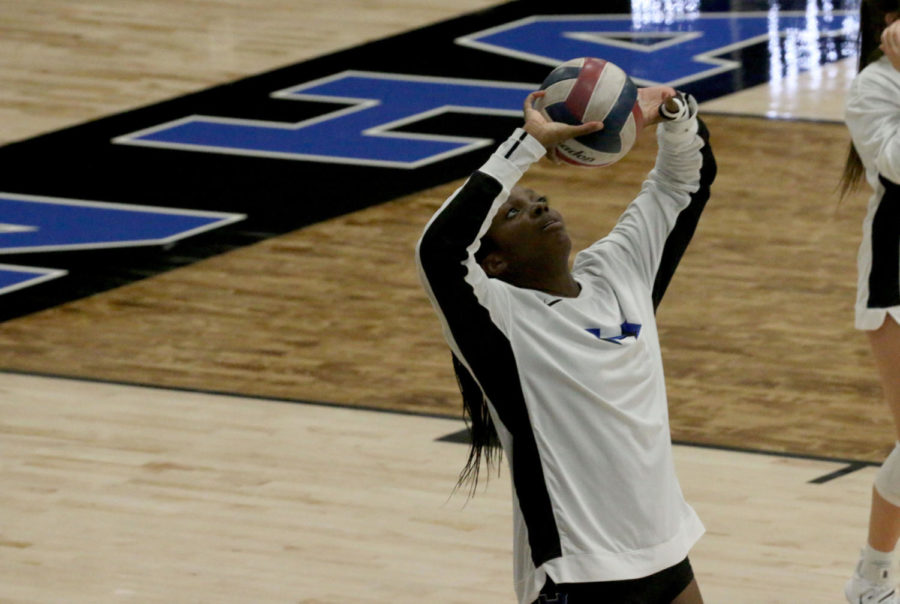 Middle hitter Lia Okammor sets the ball during a home game against Allen High School on Sept. 3. This season, Okammor has had 63 kills and 100% serve percentage. 